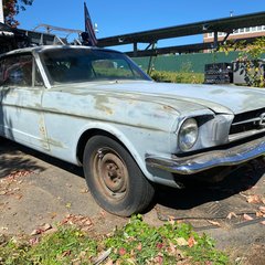 Light blue vintage Ford Mustang coupe, featured item in this auction