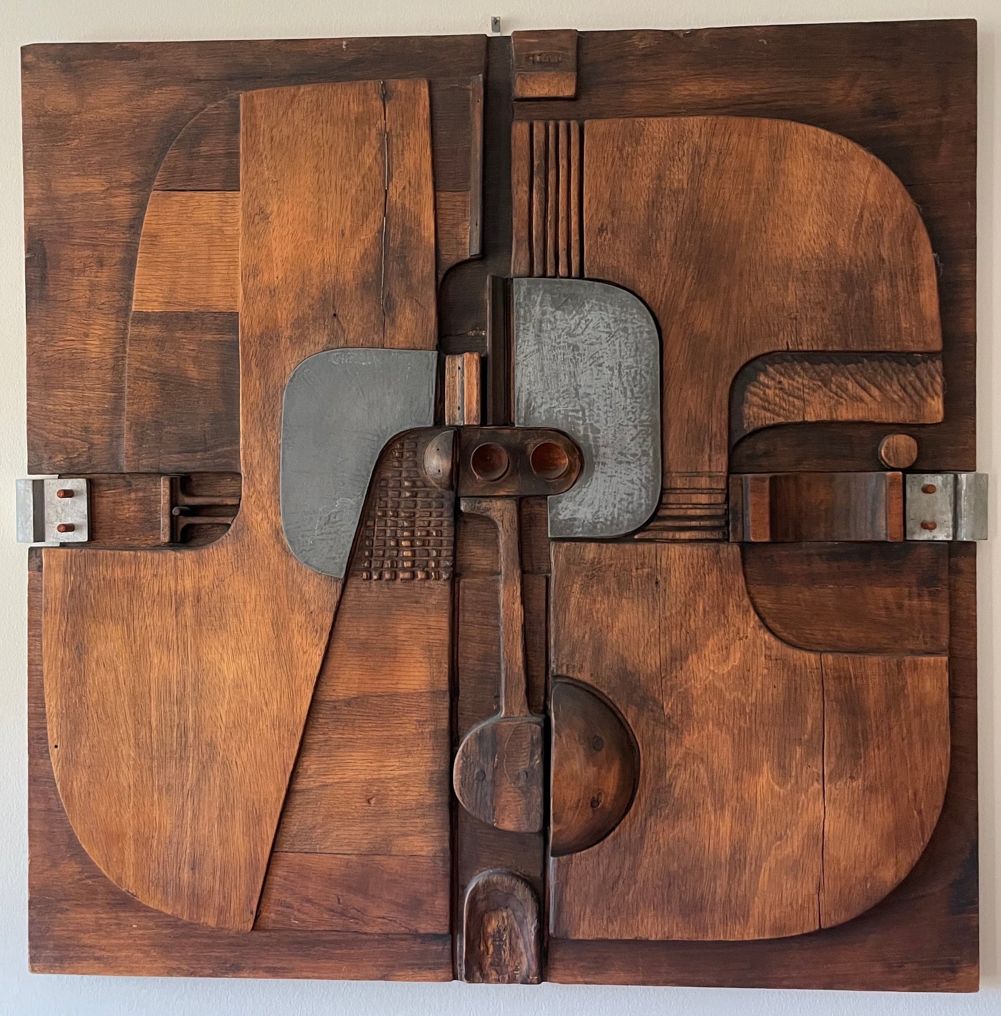 Carved wood wall sculpture