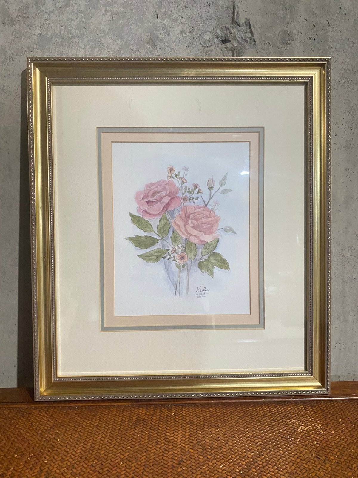 Framed watercolor of pink roses