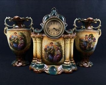 Antique ceramic mantel clock with matching vases